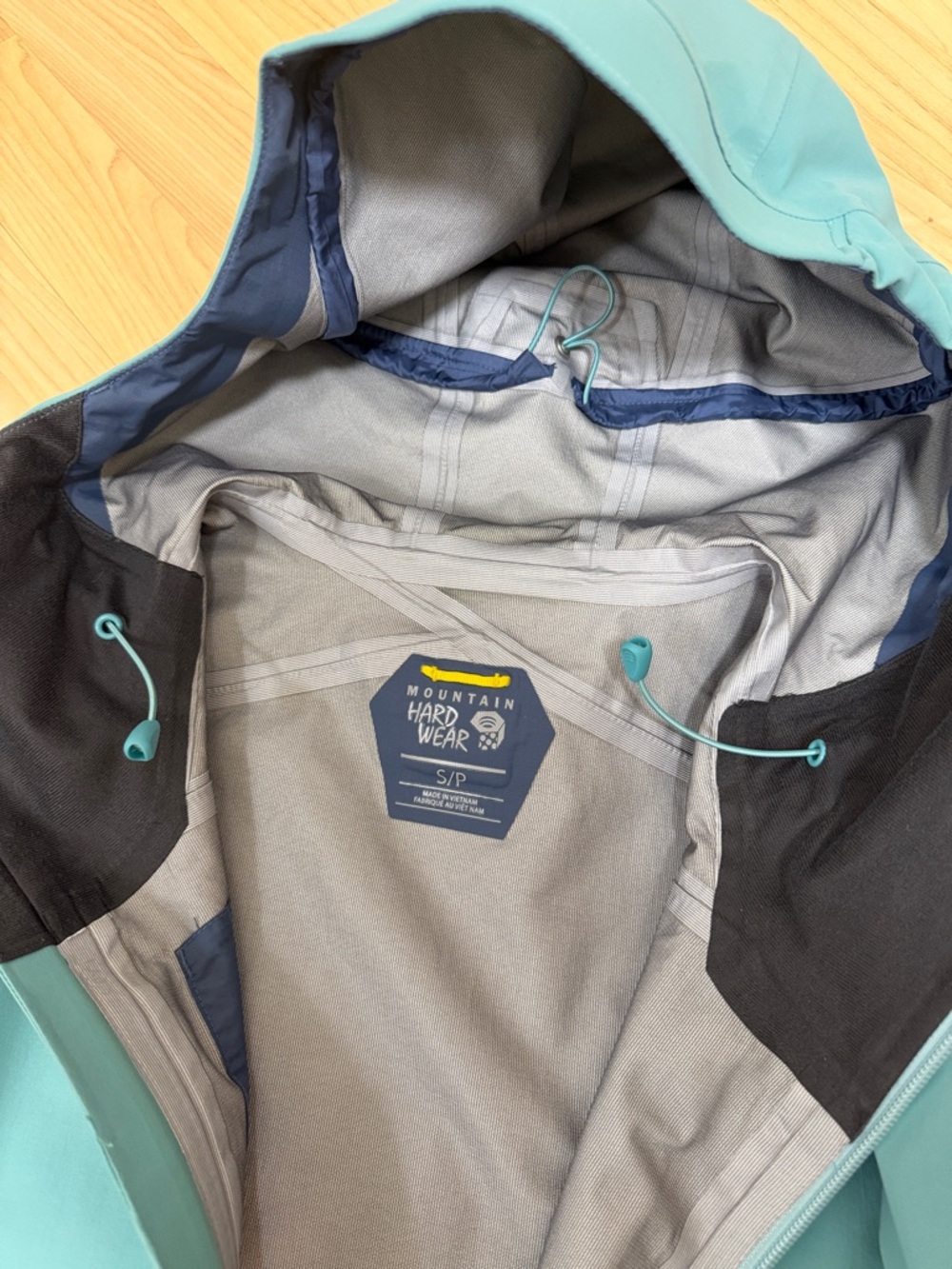 Mountain Hardwear Light Blue Hooded Shell Jacket with Yellow Zips - Picture 7 of 11